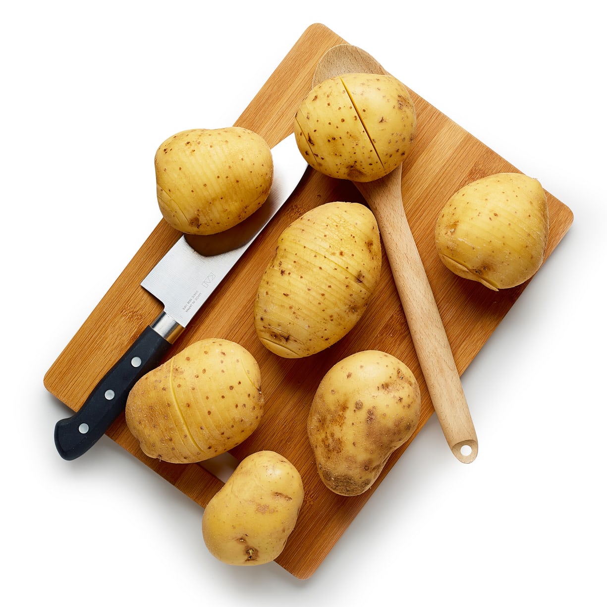 Cut into each potato, being careful not to cut all the way through.